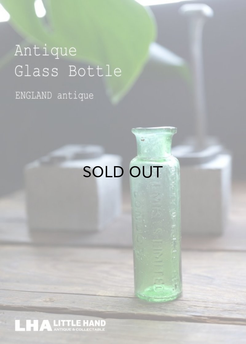 画像1: ENGLAND antique イギリスアンティーク ３列エンボスロゴ LONDON 小さなミニ ガラスボトル H7.2cm ガラス瓶 1900-20's